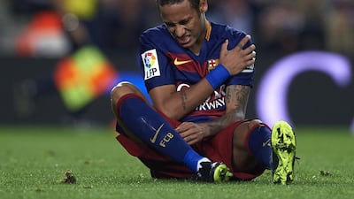 Neymar of Barcelona lies injured on the pitch during the La Liga match between FC Barcelona and SD Eibar at Camp Nou Stadium on October 25, 2015 in Barcelona, Spain. (Photo by Manuel Queimadelos Alonso/Getty Images)