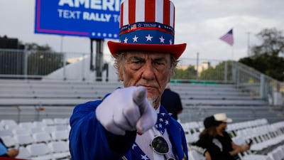 A man in costume arrives for a Republican party 'Save America' rally before the US midterm elections, in Miami, Florida. AFP