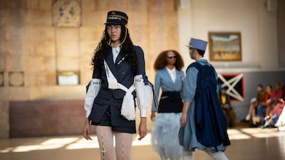 Bora Aksu's show also had touches of military uniform styles in a nod to the queen's troops. EPA