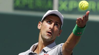 Novak Djokovic of Serbia serves the ball to Rafael Nadal of Spain during the men's singles final match at the Miami Masters tennis tournament on Key Biscayne in Miami, Florida, USA, on Sunday. Erik S Lesser / EPA / March 30, 2014