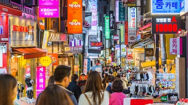 Crowds of shoppers along the pedestrianised streets of Myeong-dong in the heart of Seoul. Getty Images