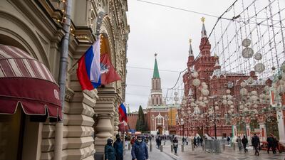 Shoppers walk past a luxury department store in Red Square, Moscow. Bloomberg