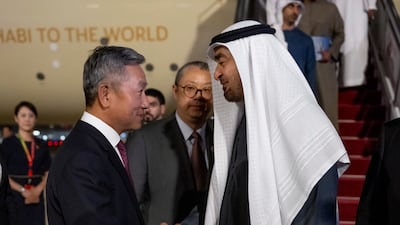 Sheikh Mohamed greets Zhang Yiming, China's ambassador to the UAE.