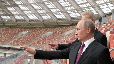 Russian President Vladimir Putin and Moscow Mayor Sergei Sobyanin at the Luzhniki Stadium, which will host matches of the 2018 FIFA World Cup. Alexei Druzhinin / Sputnik / Reuters