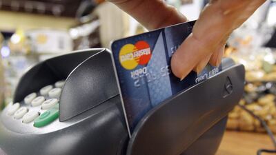 Credit card spending can stimulate the brain’s reward centre and drive you to make more purchases, according to a study. AP