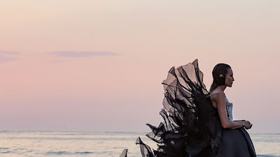 A silk faille gown arrived with a 'spine' of ruffles at Stephane Rolland for autumn / winter 2021.