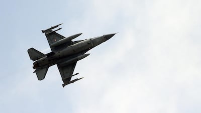 A missile-loaded Turkish Air Force warplane takes off from the Incirlik Air Base, in southeastern Turkey (AP Photo/Emrah Gurel)