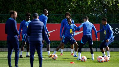 England's Raheem Sterling, Trent Alexander-Arnold and Jude Bellingham during training. Reuters