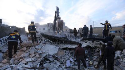 Emergency services look for survivors after airstrikes in the city of Idlib. AP Photo