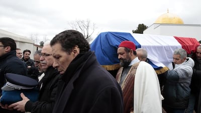‘Ahmed Merabet died protecting the innocent from hate. I salute him,’ read a message left at the scene of his death. Joel Saget / AFP Photo