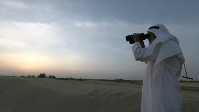 Saudi Arabia's Supreme Court has called on people to watch for the crescent moon on Sunday. Pawan Singh / The National