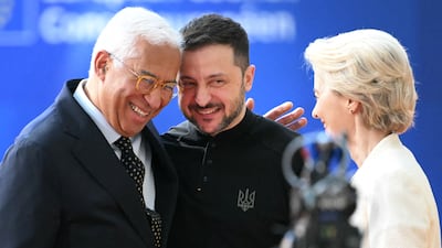 European Council President Antonio Costa and European Commission President Ursula von der Leyen greet Ukraine's President Volodymyr Zelenskyy in Brussels on Thursday. AFP
