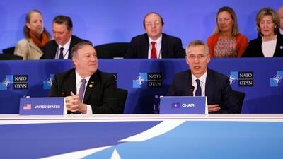 US Secretary of State Mike Pompeo looks on as Nato Secretary General Jens Stoltenberg delivers remarks during the meeting of the North Atlantic Council in the Foreign Minister's session. EPA