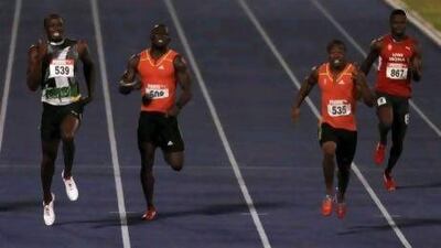 It will not be easy for Usain Bolt, left, at this Olympics with Yohan Blake, second right, and others capable of running under 10 seconds.