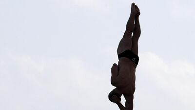Divers warm up before the final of the mens section at the Fina High Board Diving World Cup.