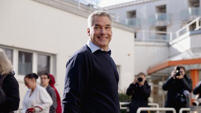 Mr Nehammer leaves a polling station on election day in Vienna. Bloomberg