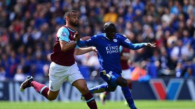 N’Golo Kante of Leicester City holds off pressure from Winston Reid of West Ham United during the Premier League match between Leicester City and West Ham United at the King Power Stadium on April 17, 2016 in Leicester, England. (Photo by Dan Mullan/Getty Images)