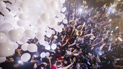 Clubbers party on New Year's Eve in Lausanne, Switzerland. EPA