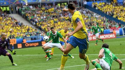 Ciaran Clark (C) of Republic of Ireland eyes the ball before scoring an own goal next to Zlatan Ibrahimovic (2nd R) of Sweden during the Uefa Euro 2016 group E preliminary round match between Ireland and Sweden at Stade de France in Saint-Denis, France, 13 June 2016. Georgi Licovski / EPA