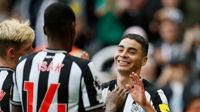 Newcastle's Miguel Almiron celebrates scoring the opener with teammates. Action Images