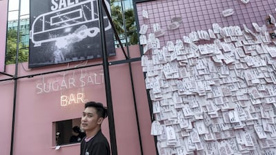 Apart from its signature shakes, softies and sliders, customers can find an interactive wall at the new location. Antonie Robertson / The National