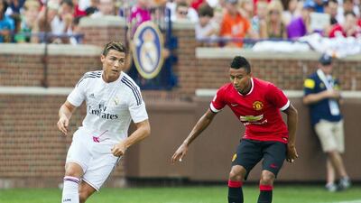 Cristiano Ronaldo, left, of Real Madrid dribbles away from Jesse Lingard, right, of Manchester United during their match on Saturday at the International Champions Cup in the US. Tony Ding / AP