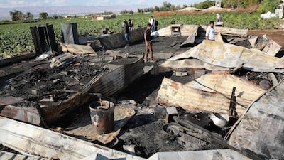 The remains of a home where several Pakistani farmers were killed in a fire in the town of Shuna in Jordan. AFP