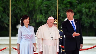 Romania's President Klaus Iohannis, his wife Carmen Iohannis and Pope Francis. AFP