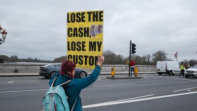 A London protester demonstrates against the rise of a cashless society and growth of the digital economy. Getty Images