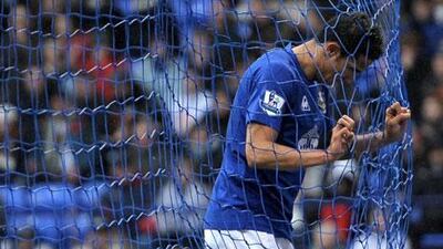 Everton’s Tim Cahill cuts a forlorn figure during Sunday’s 2-0 defeat at Bolton. It was a result which left David Moyes, the long-serving coach of the Merseyside club, in a miserable mood.