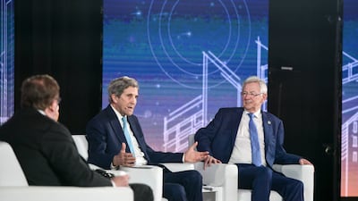 John Kerry, special US climate envoy, and Andrew Steer, president and chief executive of the Bezos Earth Fund, during a panel discussion at the Atlantic Council Global Energy Forum. Khushnum Bhandari / The National