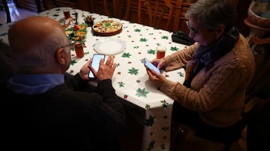 Iranians living in Barcelona try to contact relatives back in Iran during the protests. Reuters