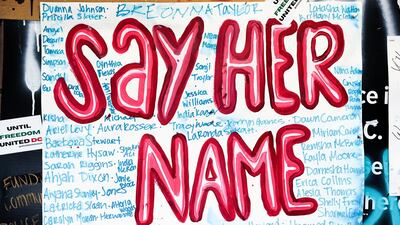 Rainwater bleeds the lettering on a protest sign at Black Lives Matter Plaza in Washington, U.S. REUTERS