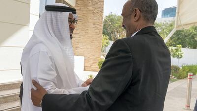 Sheikh Mohamed bin Zayed, Crown Prince of Abu Dhabi and Deputy Supreme Commander of the Armed Force, greets General Abdel Fattah Al Burhan, Chairman of Sudan's Sovereign Council, prior to a meeting at Al Shati Palace. Ministry of Presidential Affairs