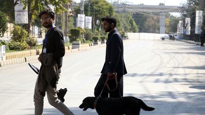 Pakistani security officials inspect the Rawalpindi Cricket Stadium. EPA