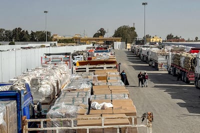 Lorries carrying humanitarian aid and fuel form a queue on the Egyptian side of the Rafah border crossing into the Gaza Strip. AFP