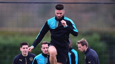 Arsenal’s Olivier Giroud warms up during the team training session on Tuesday ahead of Wedneday’s Champions League contest against Olympiakos. Dan Mullan / Getty Images