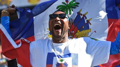 A Haiti fan cheers the team during their Copa America match against Peru last week. Mark Ralston / AFP / June 4, 2016