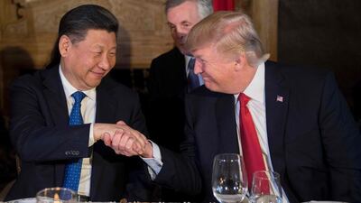 Donald Trump met with the Xi Jinping when the Chinese president visited the US. Jim Watson / AFP
