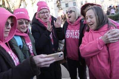Supporters of Dignity in Dying celebrate on hearing the result of the vote on the assisted death bill. PA
