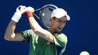 Novak Djokovic will open the Australian Open against Lukas Lacko of Slovakia. Eugene Hoshiko / AP