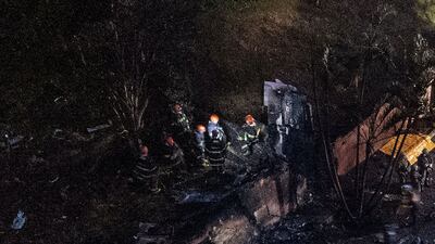 The dead included 57 passengers and four crew. AFP