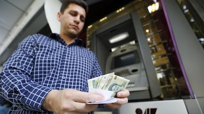 Analysts say demand could continue to grow during the rest of the year as the US sanctions come into effect over the coming months, putting further pressure on the currency. ATTA KENARE/AFP