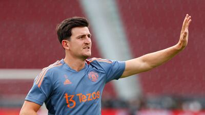 United club captain Harry Maguire waves to fans in Bangkok. EPA