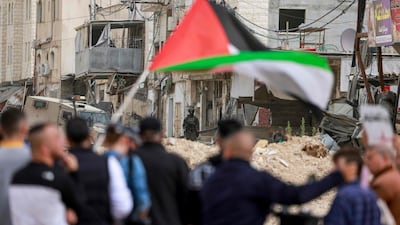 Palestinians protest after Israeli soldiers blocked the entrance of the Nur Shams refugee camp in the occupied West Bank. AFP