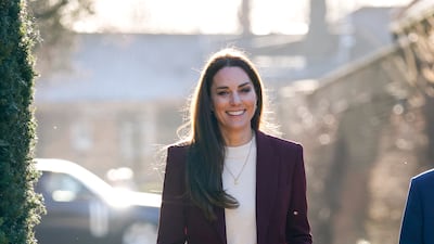 She wore a burgundy Roland Mouret suit with a cream jumper to attend a reception for the England Wheelchair Rugby League Team on January 19, 2023. Getty Images