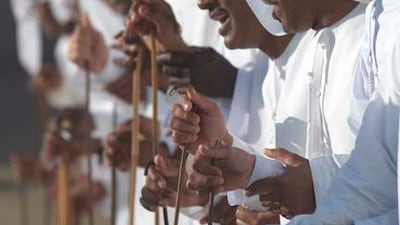 Men perform the Ayyala dance. Courtesy TCA