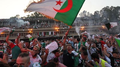 Algerian fans celebrate the triumph in Algiers. AFP