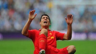 Daniel Sturridge's presence in the Liverpool starting XI can only help Luis Suarez, above, get more chances to score. Suarez is second in the Premier League with 15 goals, two behind league leader Robin van Persie of Manchester United.