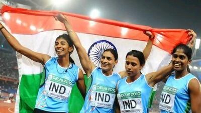 India's Sini Jose, Ashwini Akkunji, Manjeet Kaur and Mandeep Kaur celebrate their win in the women's 4x400m relay final at the Commonwealth Games in 2010. William West / AFP